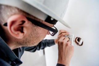 electrician is checking electrical network
